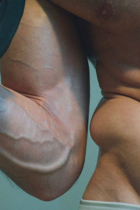 topless woman with white nail polish